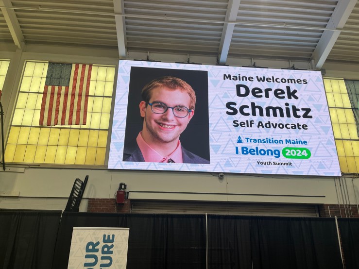 A large screen reads "Maine Welcomes Derek Schmitz, Self Advocate" with the Transition Maine "I Belong 2024 Youth Summit" branding. Derek's headshot is on the left of the screen.